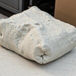 Calcul simple : combien de sacs de béton prêt à l'emploi pour couvrir 1m² ?